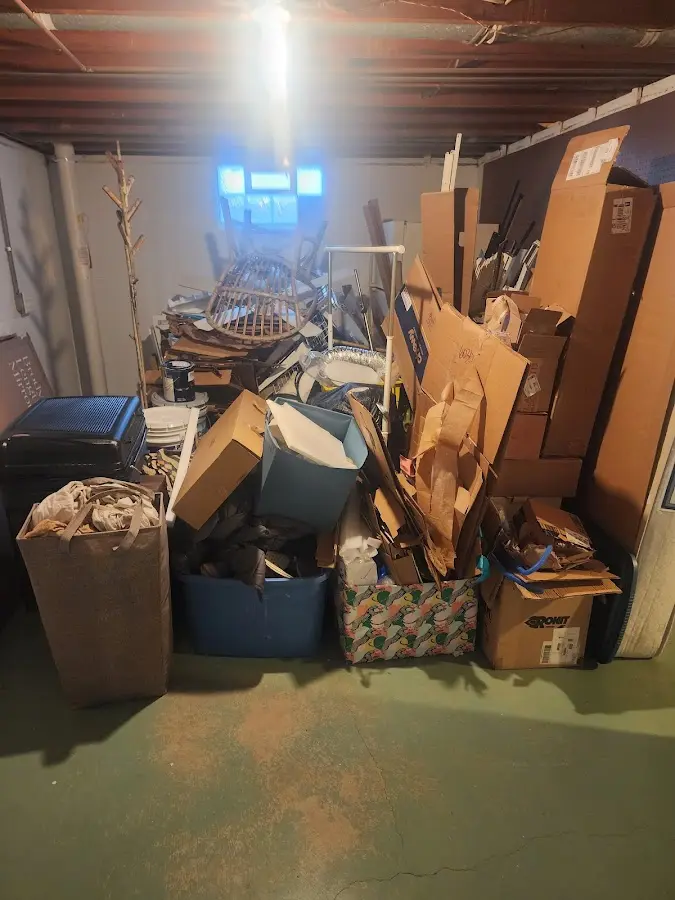 Roll-off dumpster container at job site for Yard Waste Dumpster Rental in Sellersville